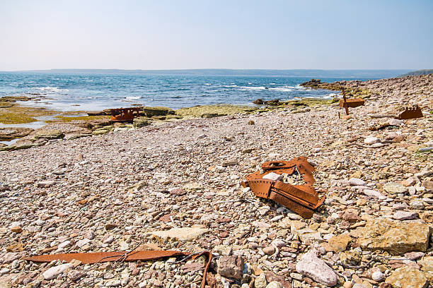 Rusty metal parts are all that's left of the HMS Raleigh which ran aground on this rocky beach on Point Amour, Labrador.