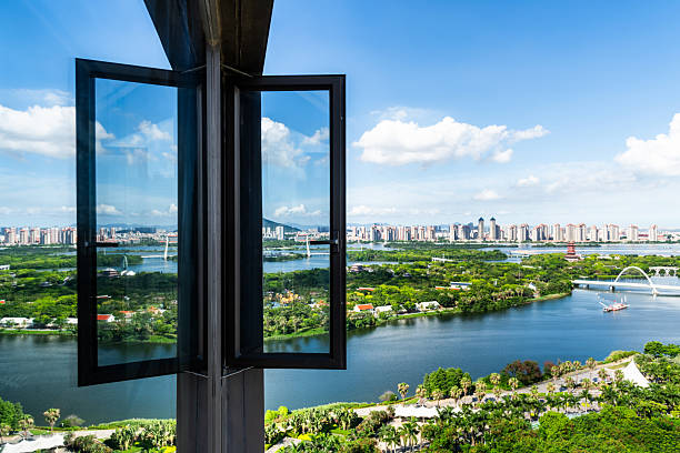 Modern architecture window glass with beautiful  landscape reflection