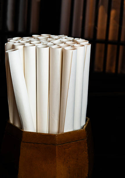 Group of traditional paper roll in a wooden container