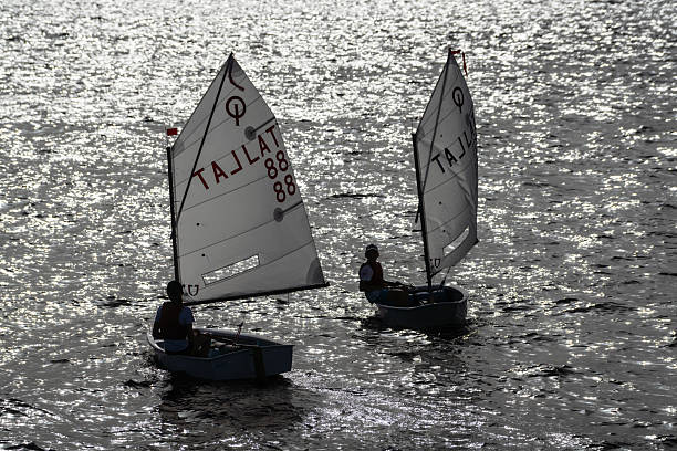 Riga, Latvia - Juny 30, 2024: Optimist class yacht race on the Daugava River