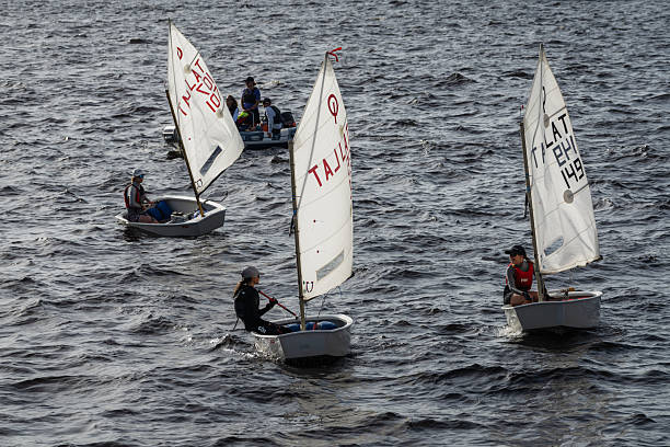 Riga, Latvia - Juny 30, 2024: Optimist class yacht race on the Daugava River