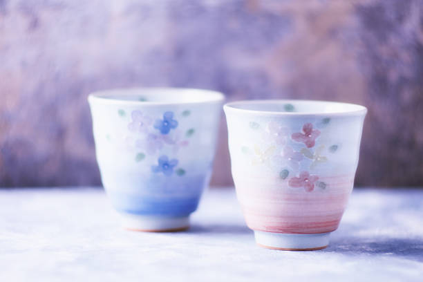 Traditional japanese ceramic on rustic wooden background. Soft focus. Copy space.