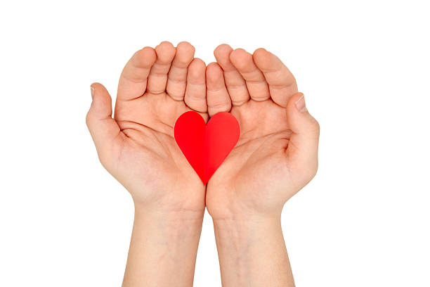 Man hand holding red heart