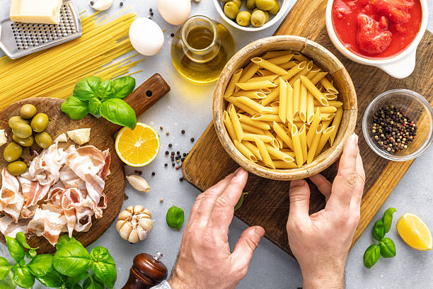 Raw ingredients cooking Italian pasta top view