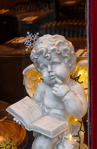 A decorative angel statue is featured as a Christmas decoration