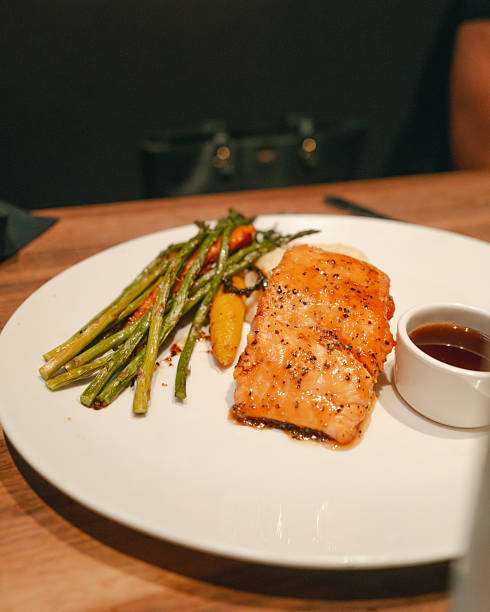 Bourbon glazed Salmon with side of roasted vegetables - Asparagus