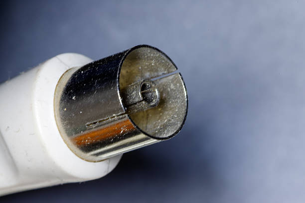 Close up view of a silver coaxial rf connector for television signal