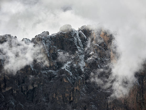 View of the Monte Antelao mountain through dramatic clouds in Dolomites, Italy. Photographed in medium format.