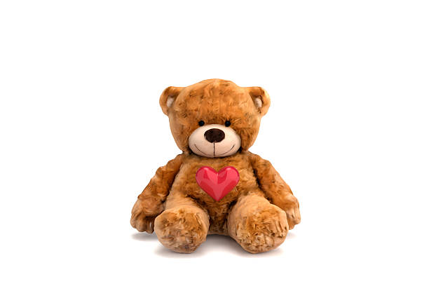 Teddy bear on yellow backgrond.