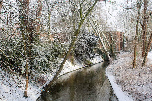 Snow covered park and bridge after rare, prolonged snowfall in the Netherlands in January of 2026.