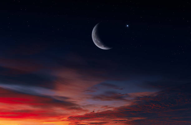 Ramadan background with crescent, stars and glowing clouds from skies. Hilal and Eid. Ramadan, islam religion. Month of Ramadan is that in which was revealed Quran. This image elements furnished by NASA. ______ Url(s):https://www.nasa.gov/nasa-at-home-videos/Adobe Photoshop CC 2023. Optical Flare. Adobe After Effects CC 2021.
