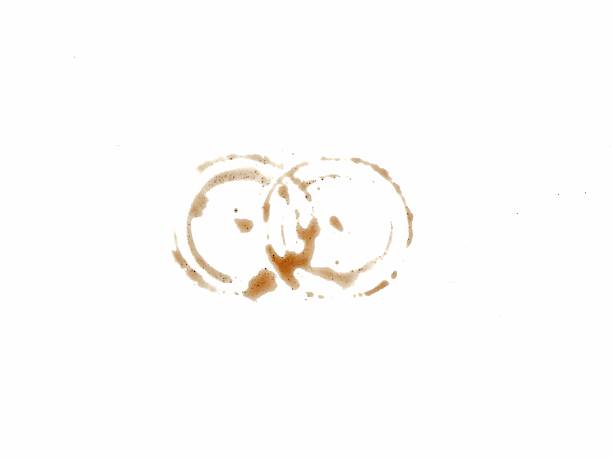 Top View of Coffee stains and splatters isolated on white background. Perfect for vintage textures, caffeine-themed designs, or abstract grunge artistic elements