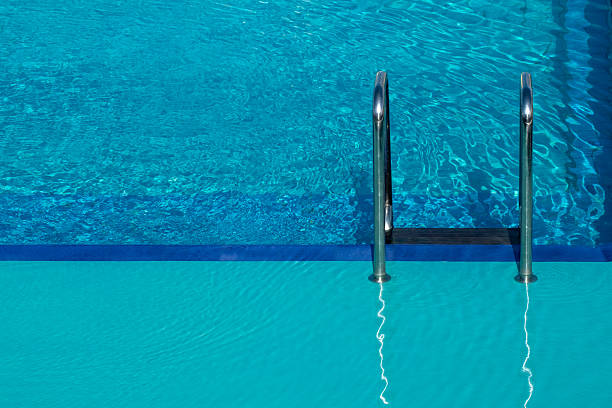 Swimming pool and ladder.