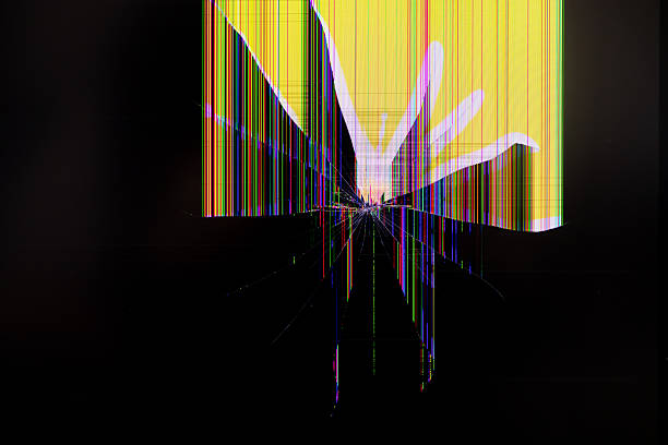 istock Broken digital LCD screen showing colorful vertical pixel lines and radiating cracks, symbolizing technology damage, device malfunction, and urgent repair 2258298063