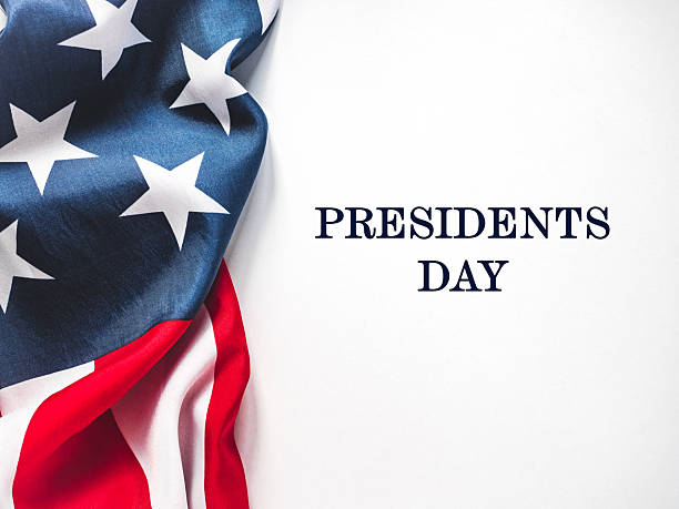 Happy Presidents' Day. American flag and congratulatory message. Greeting card layout. Close-up. Congratulations for family, loved ones, relatives, friends and colleagues