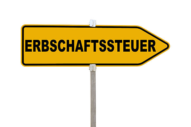 Yellow Sign on white background with the word ERBSCHAFTSSTEUER means Inheritance Tax