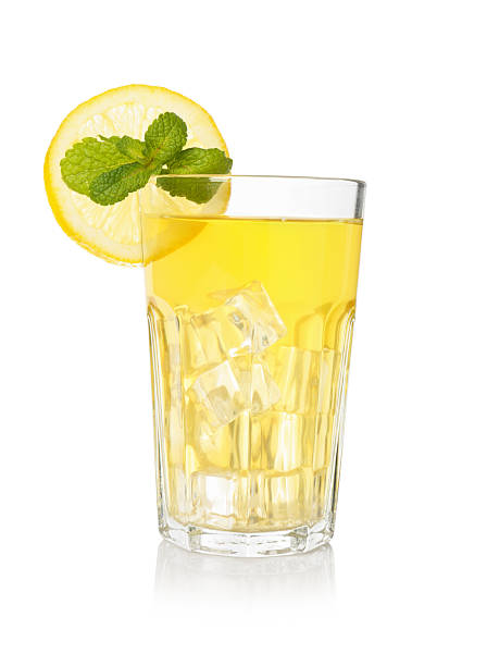 istock Refreshing iced tea with mint and slice of lemon isolated on white 2258331178