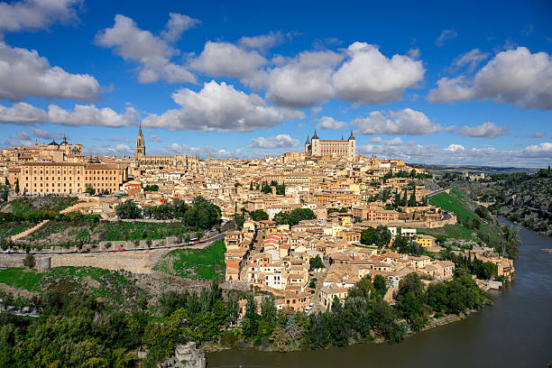 City skyline of Toledo under cloudy blue sky