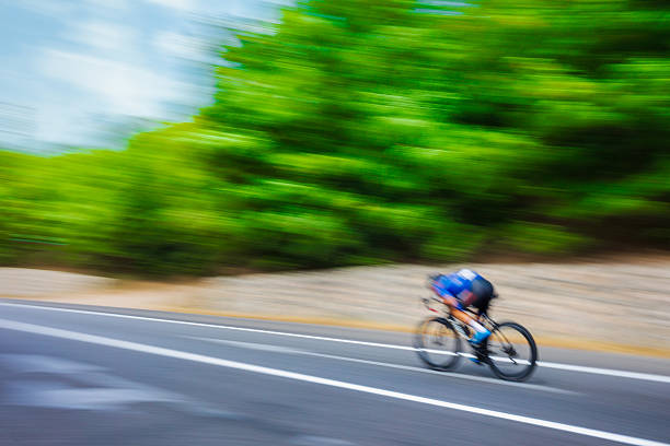 Çorum, Turkey - 01 September , 2023 : A fast-moving cyclists captured with the panning technique.
