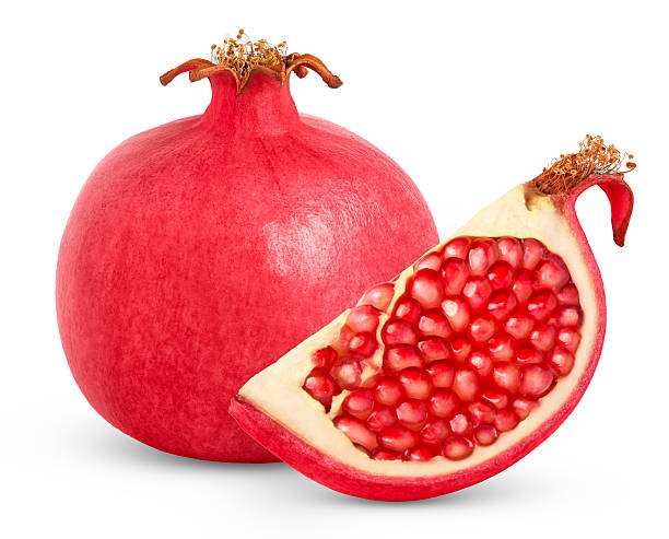 Fresh ripe pomegranate with cut in chunk isolated on white background. High quality photo