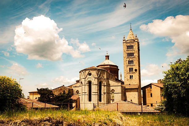 The cathedral was built starting in the 11th century in Romanesque style and continued throughout the 12th and 13th centuries. At the end of the latter century, Giovanni Pisano modified the third tier of the façade (the uppermost one) and extended the apse to its current form. In the 15th century, the wooden trussed roof of the central nave was modified with the still existing transepts, while the transepts of the side naves were added in the 17th century.