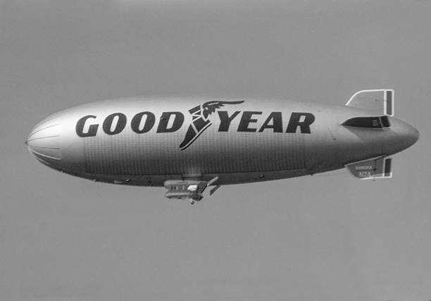 The Goodyear blimp flying above Amsterdam, the Netherlands, circa mid-1980s.The iconic airship, prominently displaying the Goodyear logo, was used for advertising and promotional flights across major cities during the late 20th century. Amsterdam, mid-1980's, North-Holland, The Netherlands.