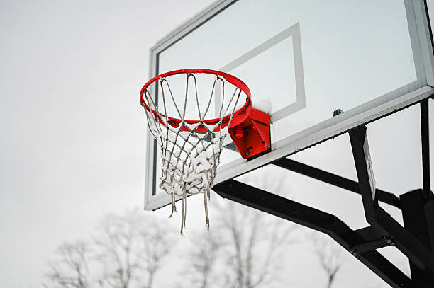 Footprints below, image made in outdoor basketball court.