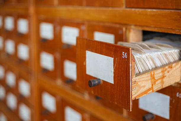 Archives with Folders and Magnifying Glass - Chalkboard Background - 3D Rendering