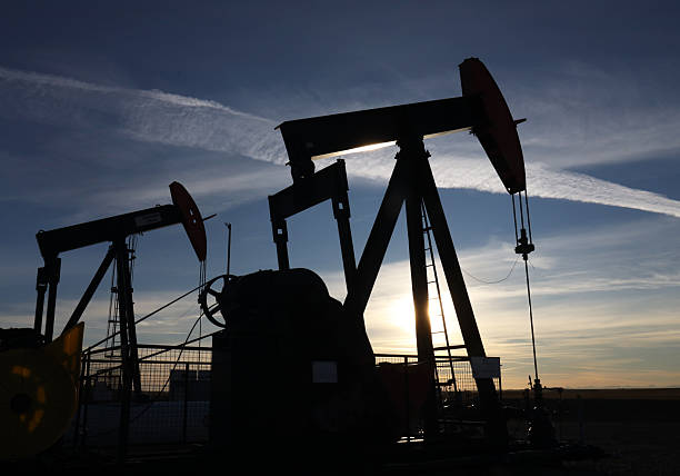 Two pumpjacks on the prairie in southern Alberta, Canada