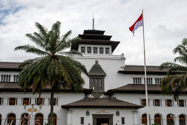The West Java Governor's office, also known as Gedung Sate, features a distinctive skewer ornament on its central tower and has become an icon of Bandung city.