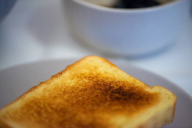 Warm, freshly prepared toasts arranged on a simple dish, capturing comfort, sharing, and nourishment at the Ramadan iftar table.
