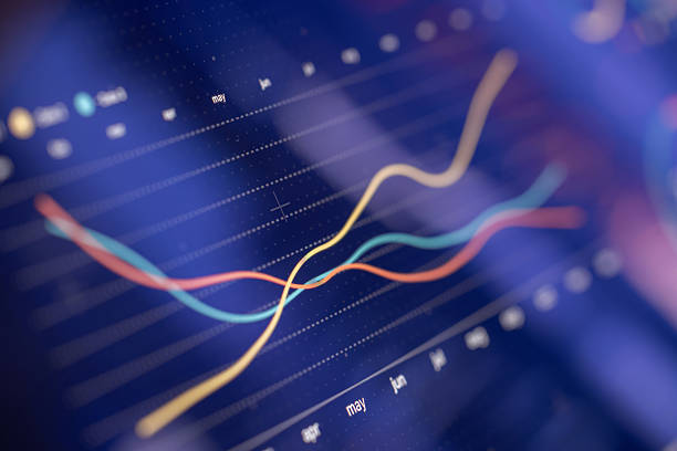A vivid composite of curved, colored lines tracing multiple data trends over a deep blue grid. This stock-style image conveys analytics, growth, and financial insight for finance, business, and tech presentations.