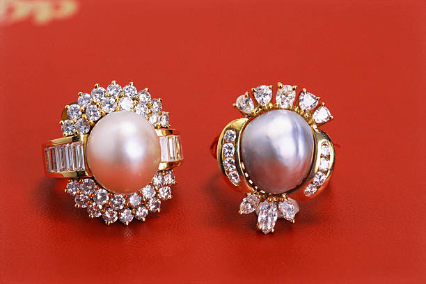 Pearl stone (Moti) is a unique organic gemstone, predominantly Calcium Carbonate formed inside mollusks like oysters, valued for its luster, white color, and emotional calming properties. Associated with the Moon in astrology, it is believed to bring peace, mental clarity, and health benefits to the wearer. Pearls are commonly worn in silver, particularly for Cancerians.