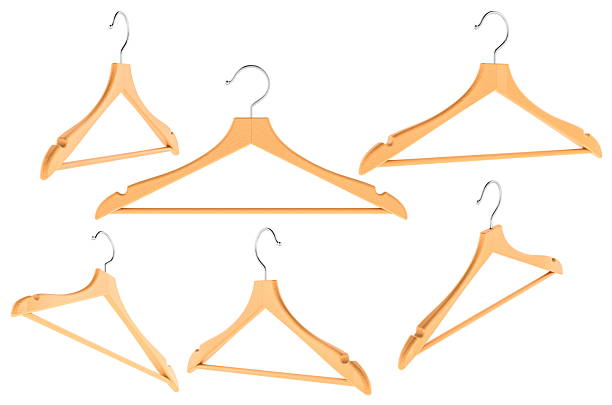 Many coat hangers hanging on a clothes rail
