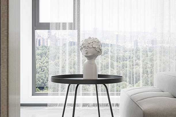 Contemporary Home Staging Minimalist Vase and Statue on Sideboard