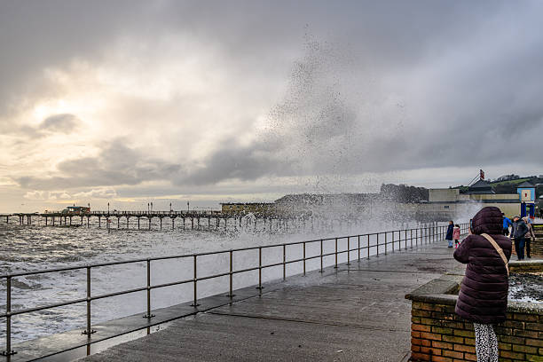 Breaking wave at the harbor pier