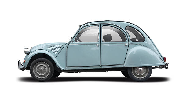 Classic French Citroën 2CV car parked on the side of the street. The deux chevaux front-wheel-drive economy car was introduced in 1948 and was produced until 1990!