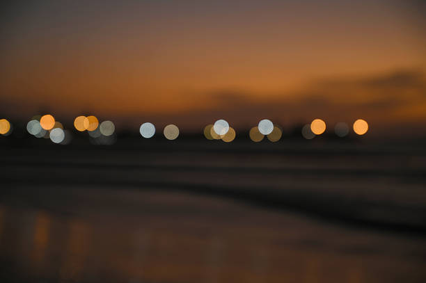 Defocused image of illuminated lights at dusk