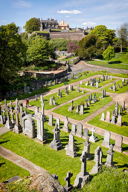 View of the 19th-century Ballengeich Cemetery with Stirling Castle, Scotland, UK