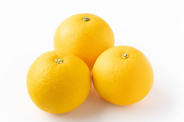 Delicious-looking hassaku orange against a white background