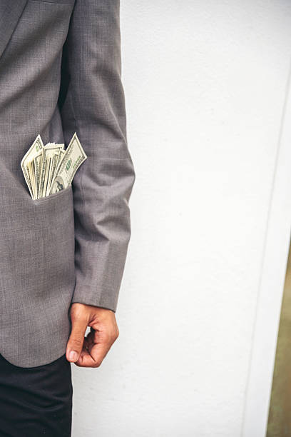 Vertical Horizon Hand holding loan money dollar bank note financial payment. Man hands show spread 100 dollar exchange cash. Vertical Saving Businessman counting money banknote bribe corruption