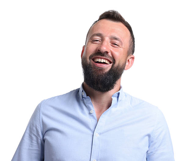 Handsome man laughing on white background. Positive emotion