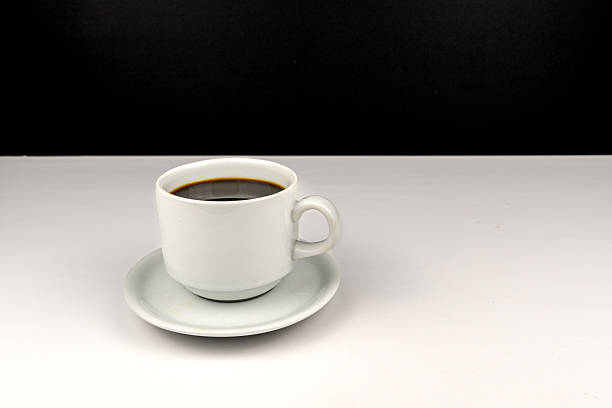 Black coffee in cup on tray