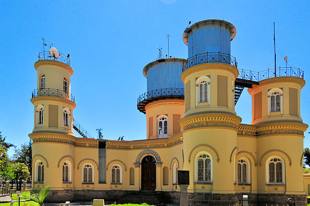 Quito, Pichincha, Ecuador: The Quito Astronomical Observatory, located in the center of Parque La Alameda, stands as one of the oldest observatories in South America. Founded in 1873 by President Gabriel García Moreno and directed by the German Jesuit astronomer Juan Bautista Menten, the structure was modeled after the Bonn Observatory in Germany. Its distinctive architecture features a Greek cross plan surmounted by a central cylindrical dome.
