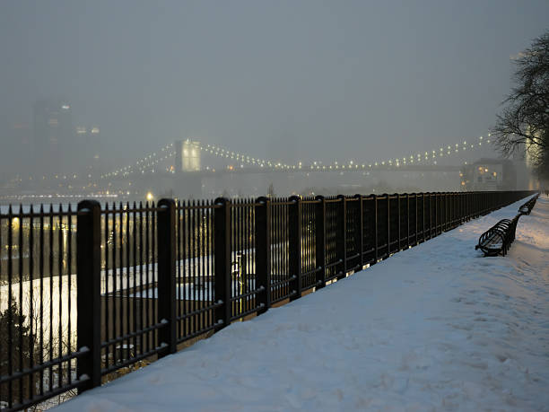 Brooklyn Bridge seen from Brooklyn Heights during a winter storm in New York, New York, United States
