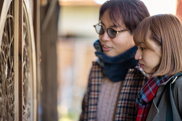 Asian tourist visiting traditional Japanese village