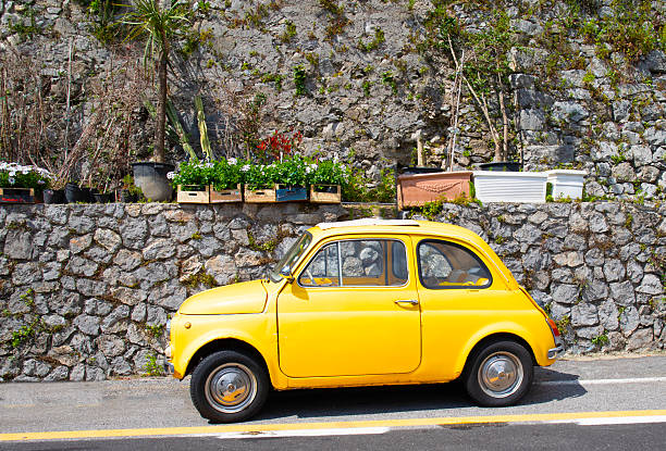 Italy Amalfi coast,  Positano town, old model small italian made car