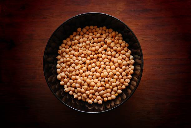 Top View of Chickpea in a Bowl on a Dark Wooden Surface