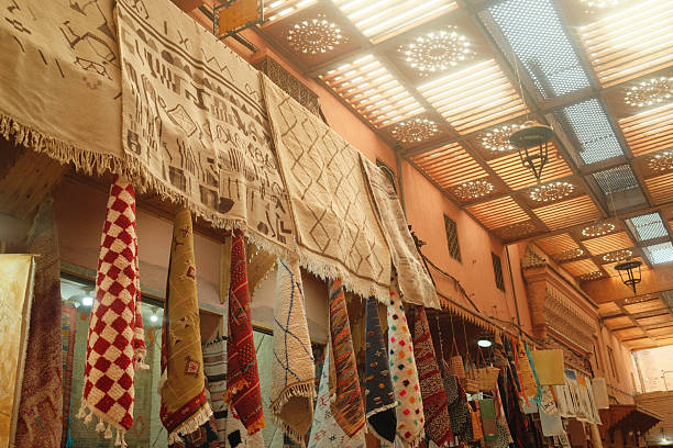 Old town Medina in Marakkesh narrow street local people at daily life Morocco
