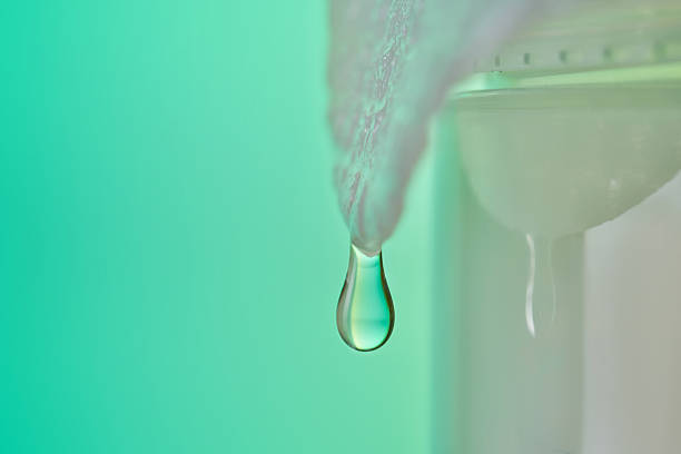 Water droplet on white background. Horizontal composition with copy space.